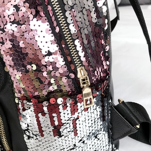 Fashionable black sequin backpack for women with shiny flip sequins and gold zipper details