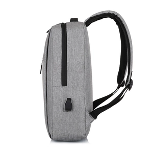 Grey minimalist business laptop backpack with side USB charging port and black zippers