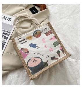 Detail of canvas tote bag with hand-drawn summer festival prints and rope handles