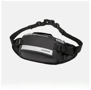Close-up of waterproof black waist bag featuring a reflective strip and durable buckle
