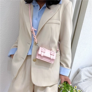 Pink mini crossbody bag in synthetic leather with square buckles and chain strap