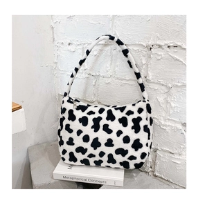 Borsa sottoascellare in peluche a macchie di mucca con cerniera argentata e stile casual