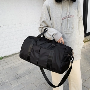 Sac de voyage noir en nylon de grande capacité avec bandoulière pour sport et week-end