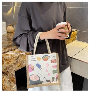 Detail of the minimalist canvas tote bag featuring cute dessert illustrations and jute straps