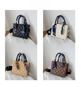 Quilted crossbody bags in black, white, beige, and brown with silk scarf handles