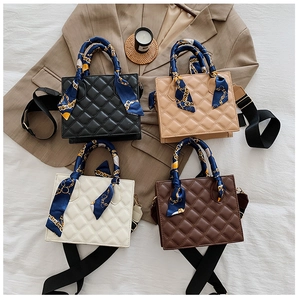 Quilted flap crossbody bags in black, beige, white, and red brown with scarf handle details