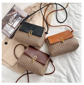 Detailed flat lay of plaid crossbody bags in black, brown, and coffee with gold buckles