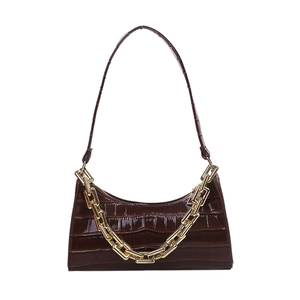 Dark brown faux crocodile leather baguette bag with thick gold decorative chain accessory