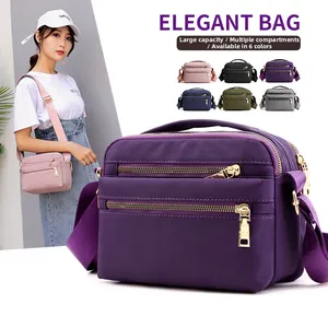 Detail of multi-compartment nylon crossbody bag showing 6 colors and spacious storage design