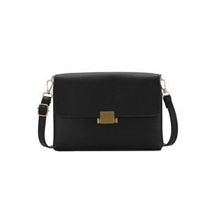 Minimalist black leather crossbody bag with elegant matte gold square metal buckle closure