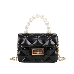 Mini quilted jelly handbag with pearl handle and golden chain strap in black finish
