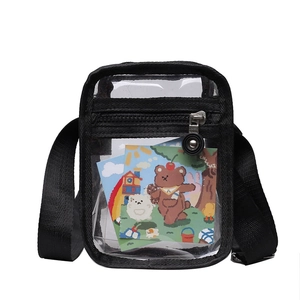 Minimalist transparent PVC small square crossbody bag with black nylon trim and cartoon cards