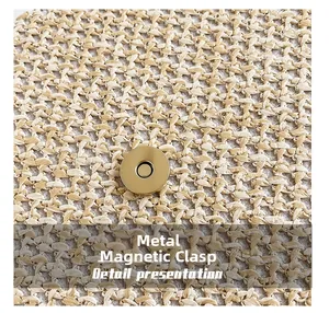 Detailed macro view of beige woven fabric texture and round golden metal magnetic clasp