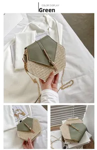 Detail of green PU leather and woven straw crossbody bag with golden tassel metal hardware
