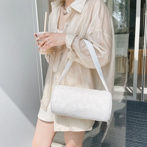 Chic white cylindrical shoulder bag with floral jacquard texture for stylish women