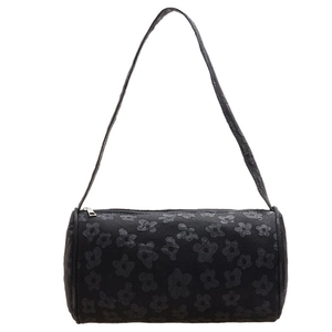 Chic black cylindrical underarm bag with elegant 3D floral texture and zipper