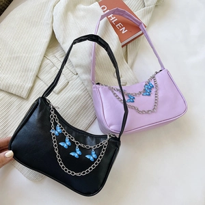 Fashionable black and purple underarm bags with silver butterfly chains and smooth texture