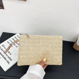 Handmade woven wheat straw clutch bag with V-pattern and zipper closure for women