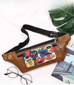 Detail of brown PU leather waist bag with three metal zippers and adjustable buckle strap