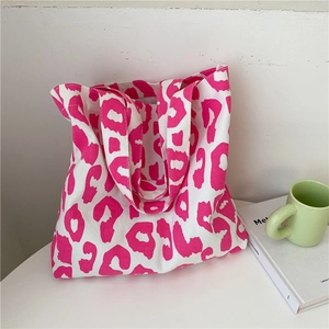 Grand sac cabas en toile avec imprimé léopard rose vif et larges anses solides