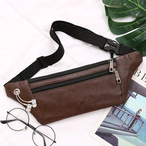Deep brown faux leather waist bag with double zippers and headphone port on white background