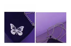 Close-up of glittery silver butterfly print on dark purple oxfort cloth phone bag