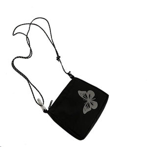 Minimalist black square crossbody bag with reflective butterfly print and woven rope strap