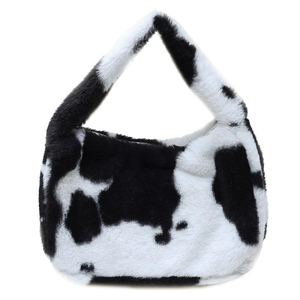 Chic cow print faux fur tote bag for women featuring a minimalist half-circle plush design