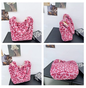 Detail view of pink leopard faux fur tote bag showing soft plush texture and pattern