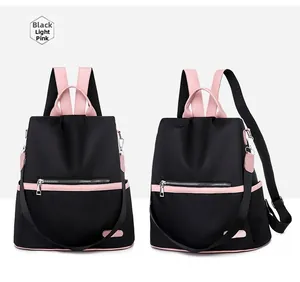 Detail view of the rear anti-theft zipper and two-tone nylon fabric on this casual backpack