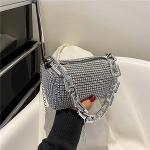 Sparkling silver rhinestone cylinder handbag with metallic chain strap for evening events