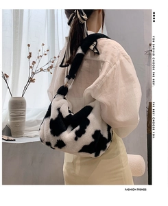 Fuzzy cow print underarm bag for women with plush faux fur material and a chic Korean style