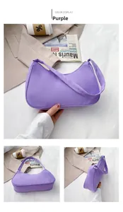 Detailed views of the purple nylon crescent shoulder bag with various camera angles