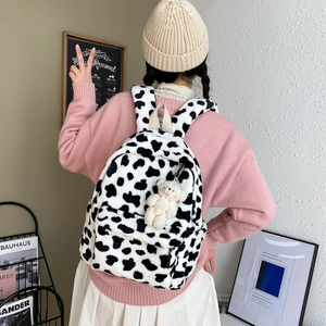 Zaino di peluche con stampa mucca e ciondolo a forma di orso per stile casual quotidiano