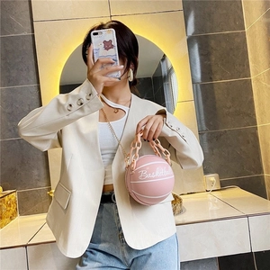 Pink basketball shaped round crossbody bag with gold chain strap for women