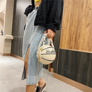 Chic cream white basketball shaped crossbody bag with chunky chain and metallic strap