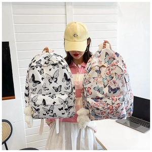 Detailed view of spacious butterfly print backpacks with functional multi-pocket design