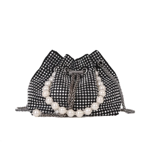 Elegant black rhinestone bucket bag with pearl handle and silver chain strap for women