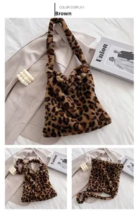 Detail view of large leopard print plush tote bag on white bedding with cozy props