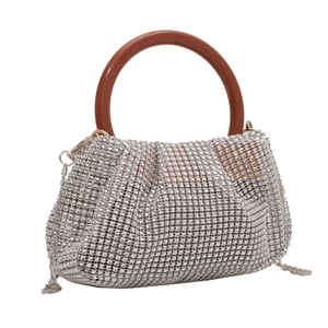 Sparkling crystal woven clutch bag with brown round resin handle and chain strap