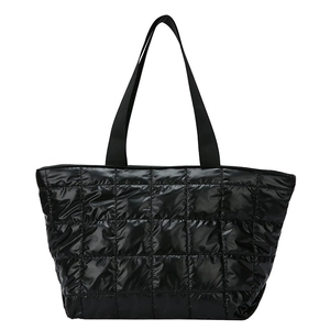 Large black shiny quilted puffer tote bag with wide strap handles for daily commute
