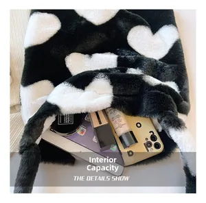 Spacious interior of plush heart tote bag showing space for tablet and makeup