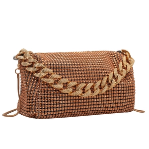 Amber rhinestone evening handbag with chunky gold handle and elegant crossbody chain strap