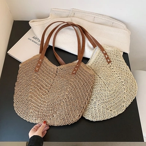 Large capacity straw woven tote bags in beige with brown leather handles for summer