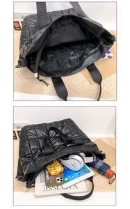 Detail view of large black quilted nylon tote bag with organized internal storage compartments