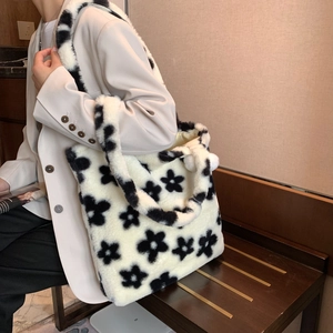 Furry plush tote bag with black and white floral pattern for autumn and winter outfits