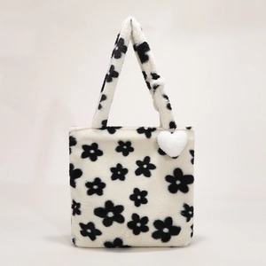 Cute black and white flower plush tote bag with a white heart charm for women