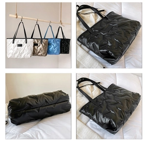 Quilted tote bags in black white blue and bronze with fasion label and shoulder straps