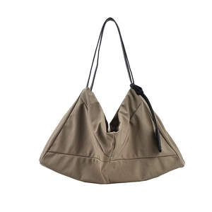 Minimalist large capacity khaki shoulder bag with black leather straps for women
