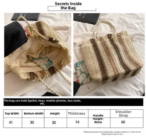 Tabella delle taglie per la borsa in paglia a righe verticali con frange decorative